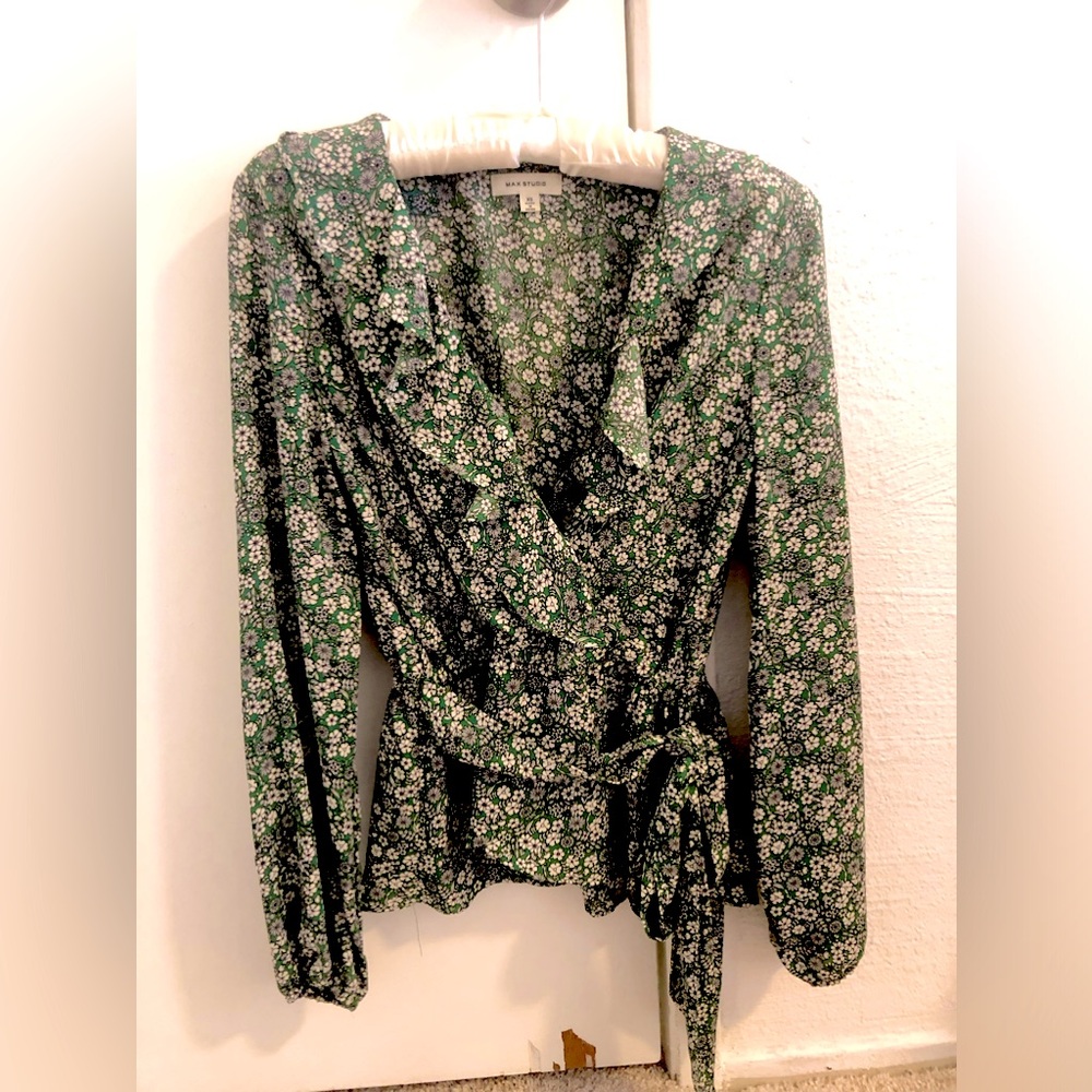 Green and white floral blouse